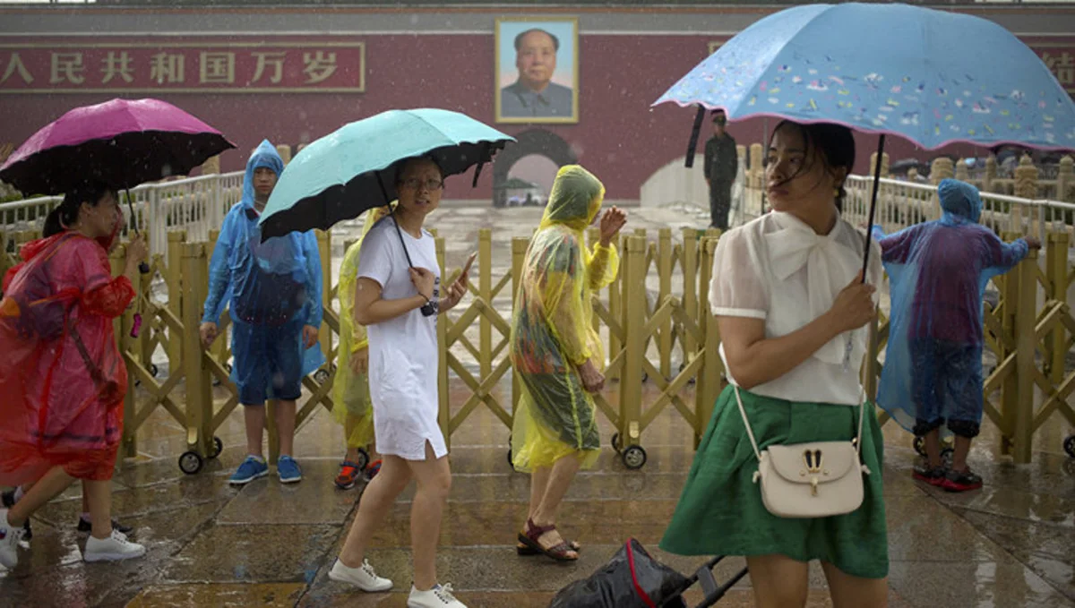 Floods and showers kill 26 people in southern China