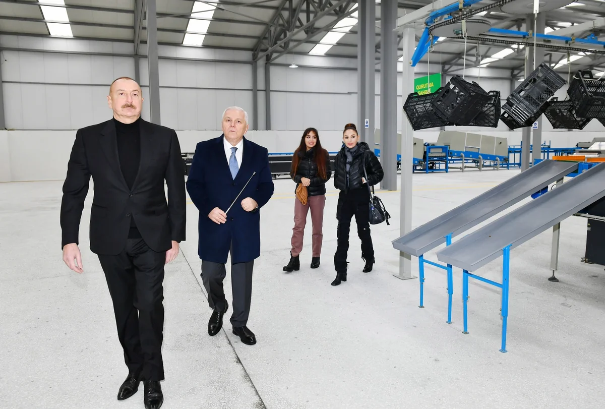 Ilham Aliyev views conditions created at dried fruit production enterprise in Orta Zayzid village