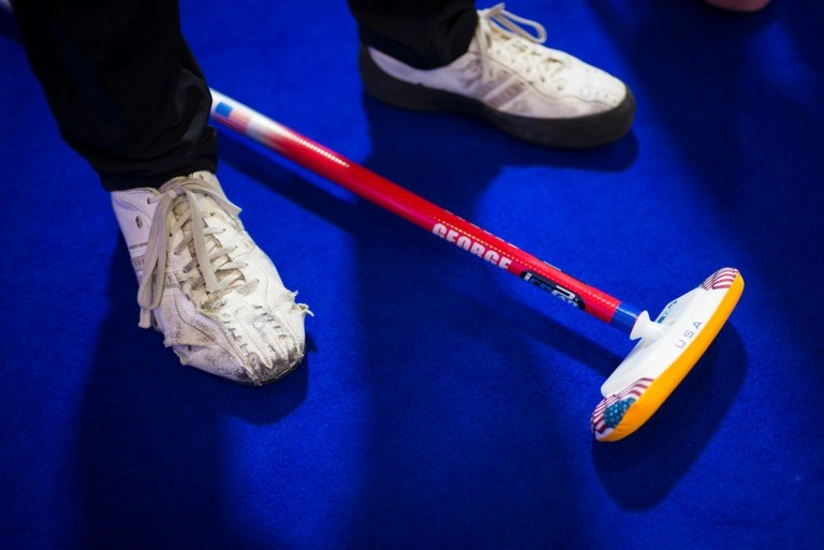 Olympic curler from US takes part in rip shoes