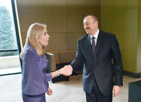 President Ilham Aliyev presents Dostlug Order to President of ELPIDA Association
