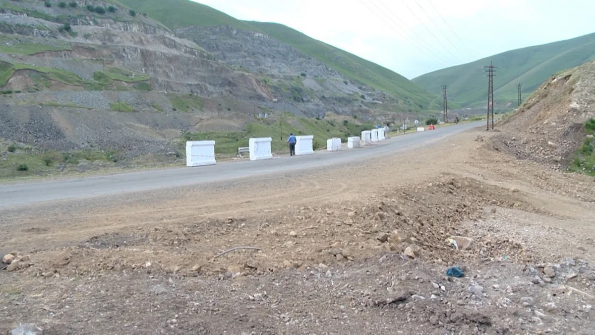 Şəkidə sel suları nəticəsində sıradan çıxan yol bərpa olunub - FOTO