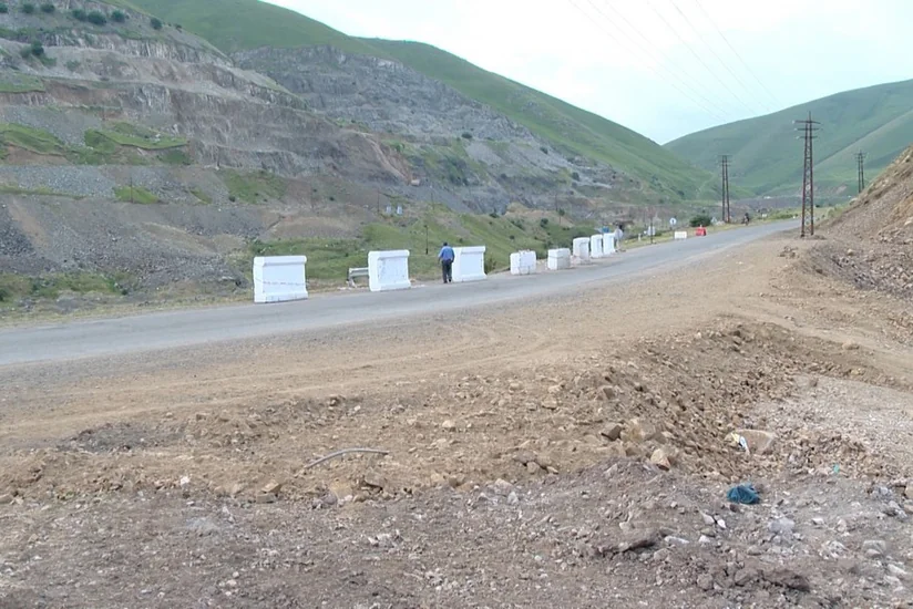 Şəkidə sel suları nəticəsində sıradan çıxan yol bərpa olunub - FOTO