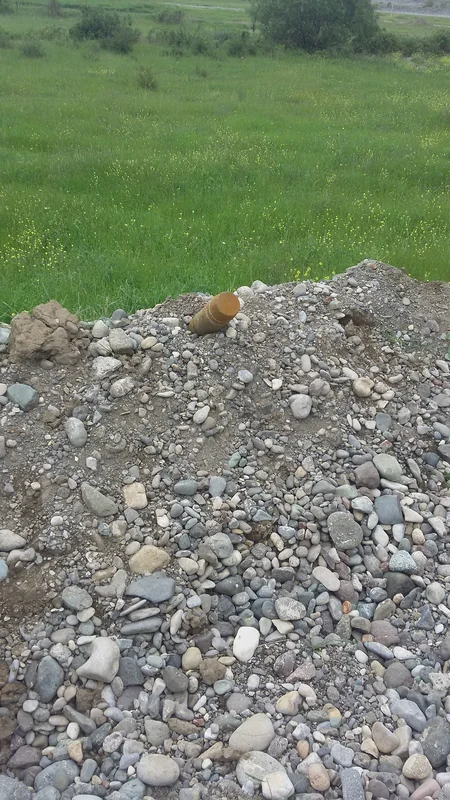 ANAMA 100 mm-lik partlamamış top mərmisi aşkar edib