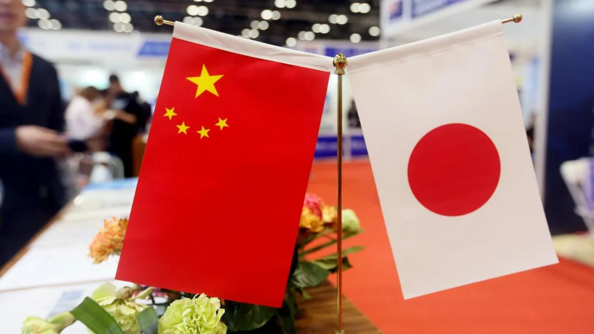 China's FM urges Japan to take concrete actions to improve ties