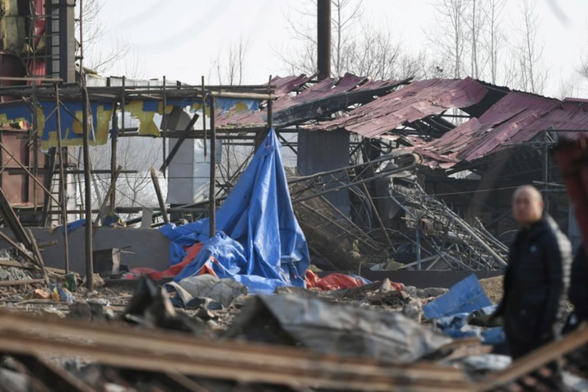 China factory blast kills two, injures 57