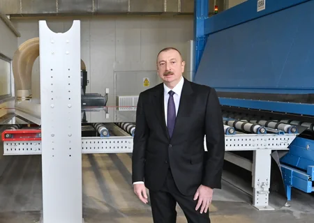 Президент заложил фундамент двух заводов и открыл предприятие в Сумгайыте