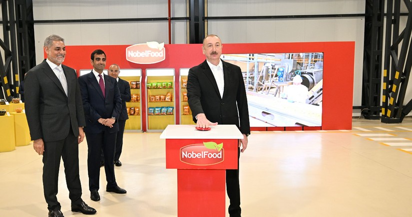 İlham Əliyev Bakıda müxtəlif növ və çeşiddə qəlyanaltı məhsullarının istehsalı zavodunun açılışında iştirak edib