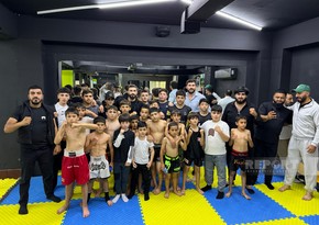 UFC döyüşçüsü Nazim Sadıxov Tbilisidə azərbaycanlı və gürcü gənc idmançılarla görüşüb