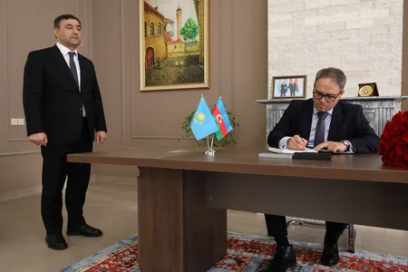 Kazakhstan's Prime Minister Bektenov leaves note in book of condolences at Azerbaijani Embassy in Astana