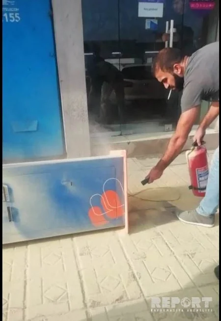 Bakıda “E-manat” ödəniş aparatında tüstüləmə olub, külli miqdarda pul yararsız hala düşüb - FOTO