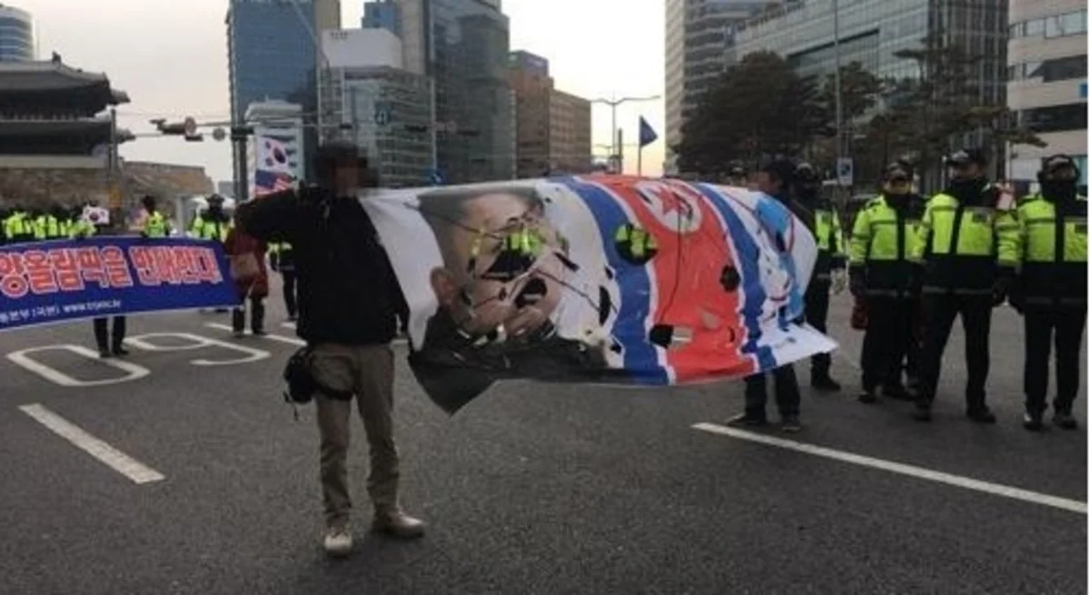 Жители Сеула протестуют против участия атлетов из КНДР в Олимпиаде
