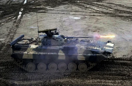 Armored vehicles battle shooting exercises started in frontline zone