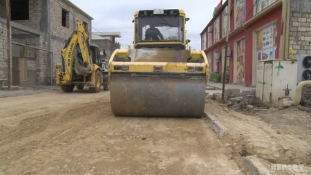 Bakının Sulutəpə qəsəbəsində yol infrastrukturu yenidən qurulur - VİDEOREPORTAJ