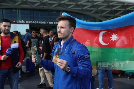 Dünya Kubokunda qızıl medal qazanan Azərbaycan gimnastı Vətənə qayıdıb
