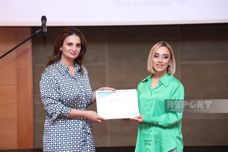 Dövlət Komitəsi Reportun əməkdaşını mükafatlandırıb