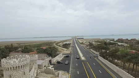 President Ilham Aliyev inaugurates a new bridge in Pirallahi settlement