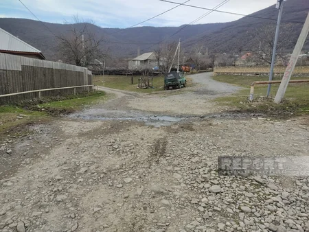 Asfalt dağılıb, yağış yağan kimi palçıq dizə çıxır - Calut sakinlərinin yol problemi