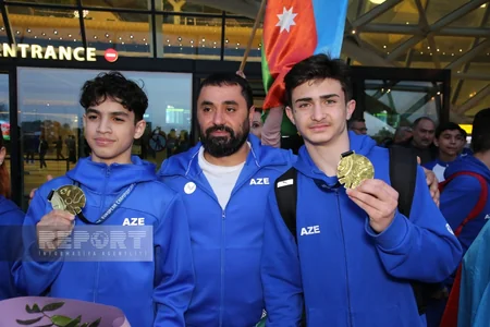Avropa çempionatında qızıl medal qazanan gimnastlarımız Vətənə dönüblər