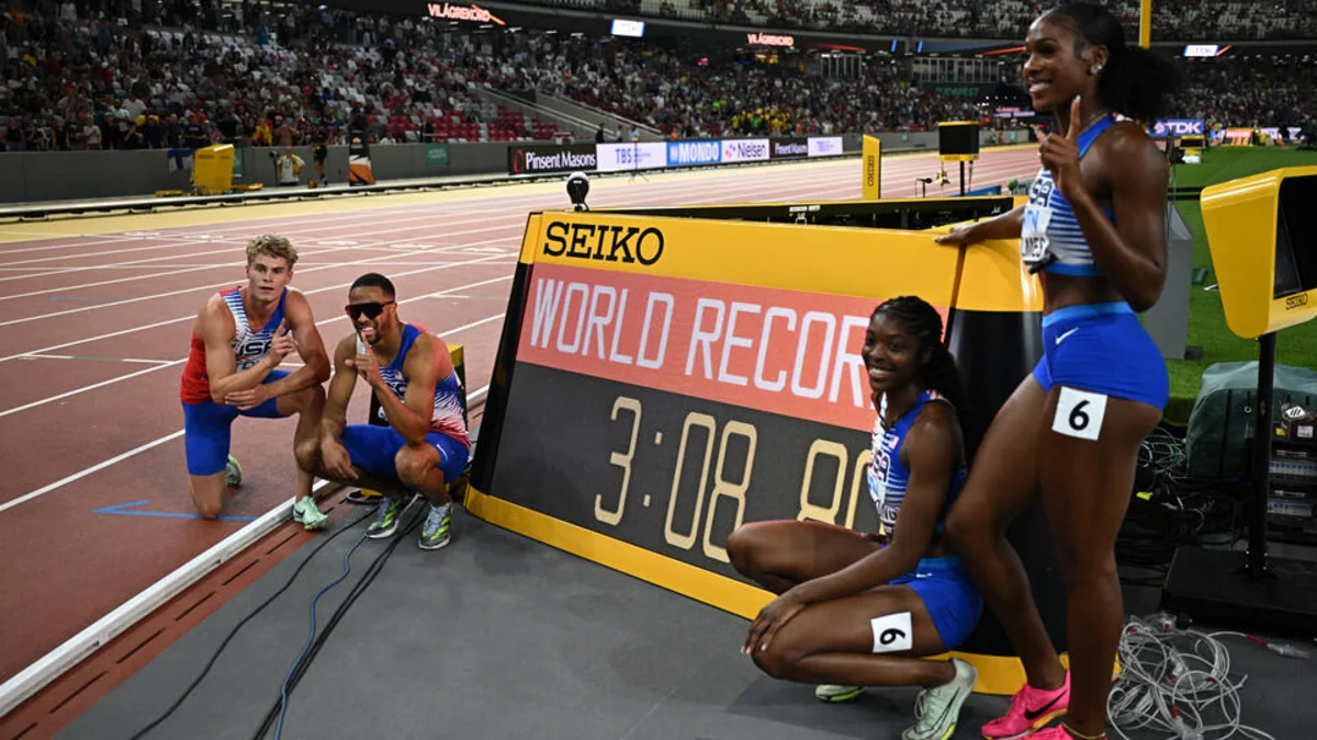 US team wins mixed relay with world record