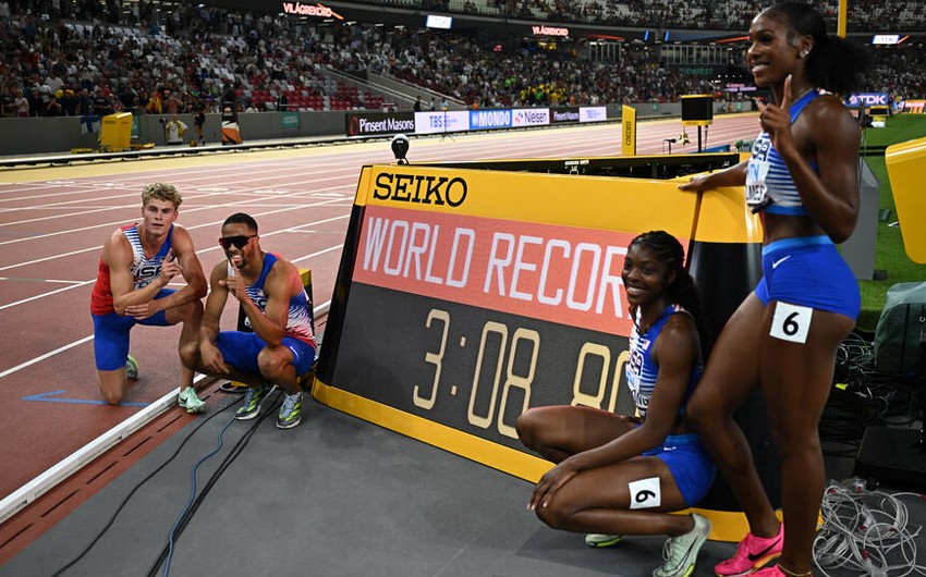 US team wins mixed relay with world record