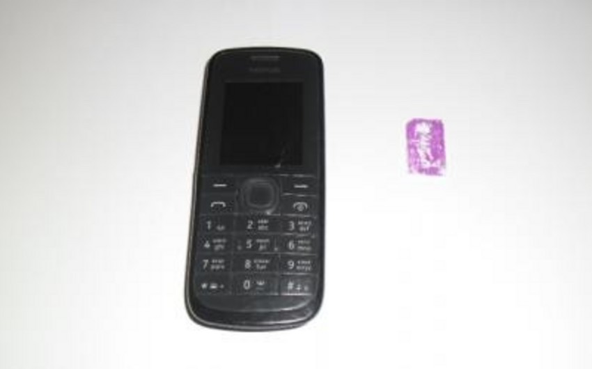 Həbsdəki ərinə telefon ötürmək istəyən qadın tutulub Həbsdəki ərinə telefon ötürmək istəyən qadın tutulub