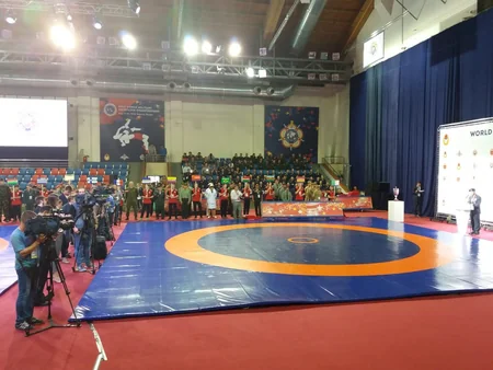 Hərbçilər arasında dünya çempionatında 11 medal qazanan Azərbaycan güləşçiləri vətənə dönüblər