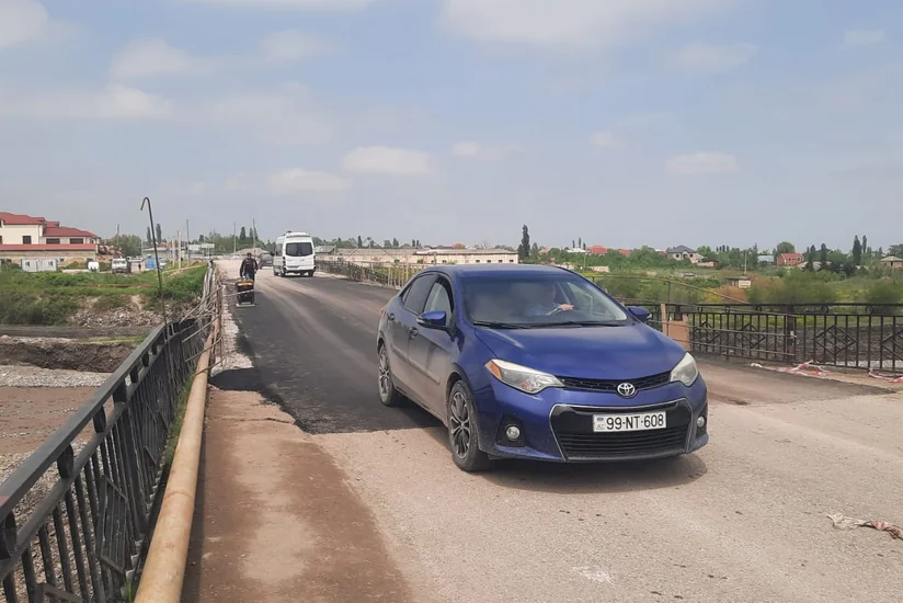 Qubada sel sularının qəzalı vəziyyətə saldığı körpü bərpa olunub