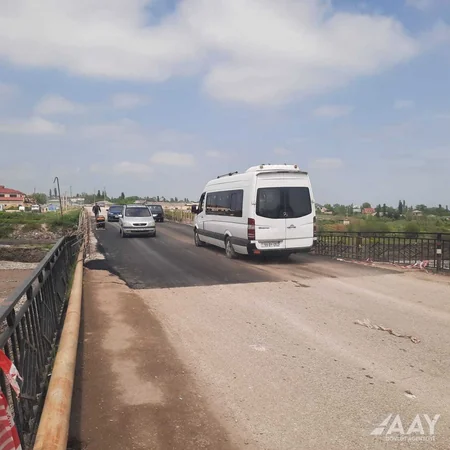 Qubada sel sularının qəzalı vəziyyətə saldığı körpü bərpa olunub
