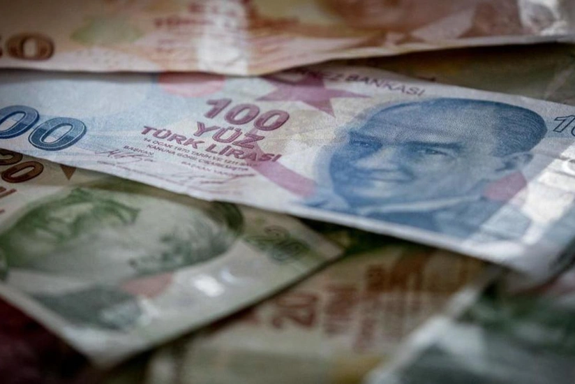 Turkish lira drops to new record low against dollar