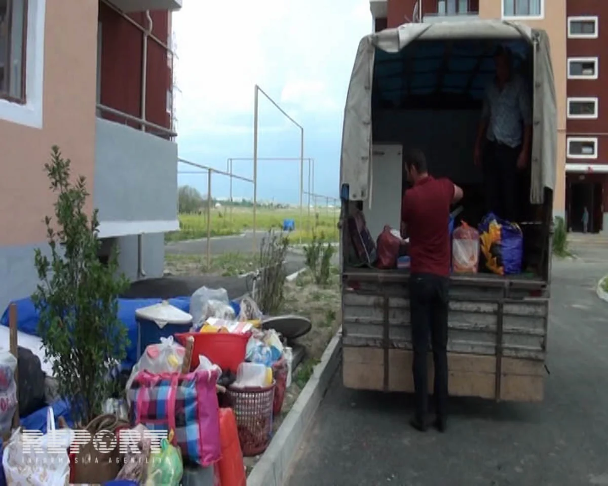 Tərtərdə 1100 məcburi köçkün ailəsi yeni mənzillərə köçürülüb - FOTO
