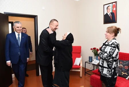 President Ilham Aliyev views new residential complex for IDPs in Tartar district