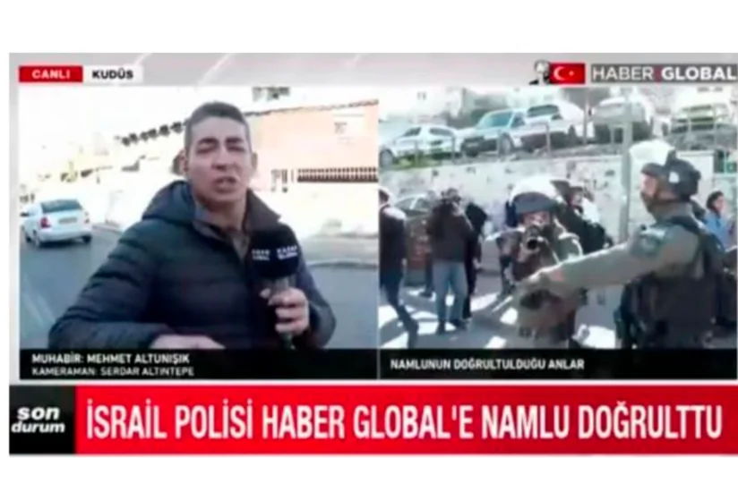 Israeli police point gun at employees of Haber Global in Al-Quds