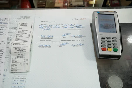 ГНС оштрафовала более 120 налогоплательщиков за операции Card to card