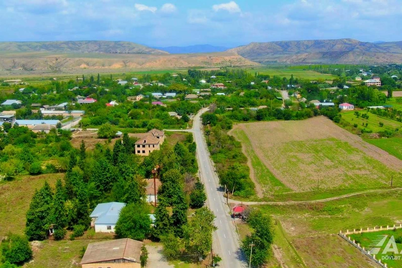 Ağsuda 12 yaşayış məntəqəsini birləşdirən yolun tikintisi yekunlaşıb