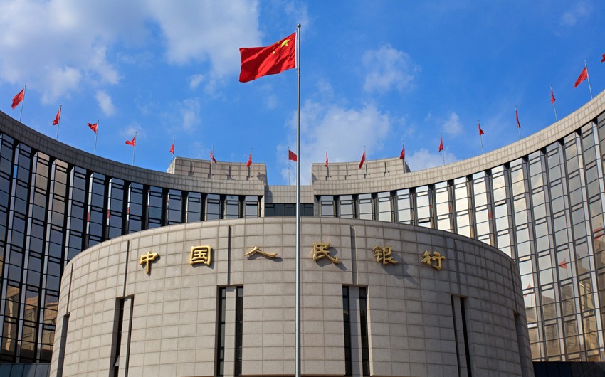 China cuts benchmark lending rates for first time in 7 months 