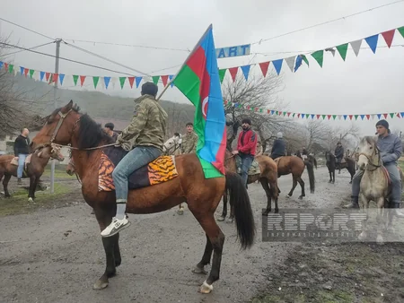 Qaxın Əmbərçay kəndində Novruz şənliklərində at yarışları keçirilib