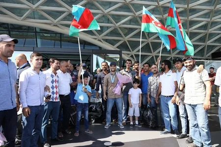 Şotlandiyada 14 medal qazanan usta cüdoçularımız vətənə qayıdıblar