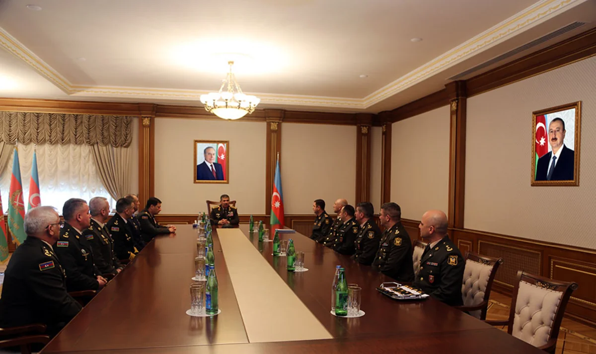 A group of servicemen conferred next military rank of Colonel