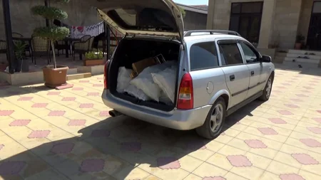 Saxta spirtli içkilər hazırlayan ata və oğuldan ibarət dəstə üzvləri tutulub - VİDEO