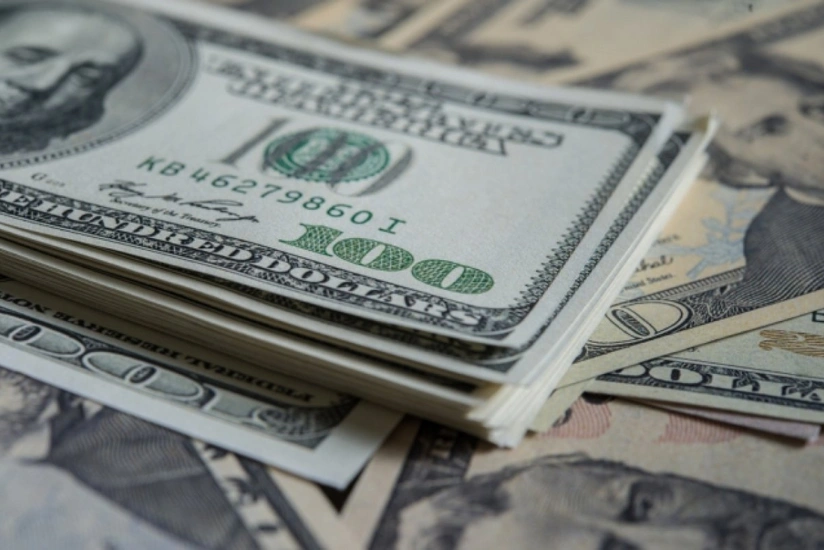 Dollar falls slightly against euro, yen and pound sterling