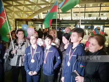 Dünya yaş qrupları yarışında 5 medal qazanmış Azərbaycan gimnastları vətənə dönüblər