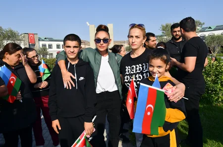 Ilham Aliyev, Mehriban Aliyeva meet with Aghali village residents