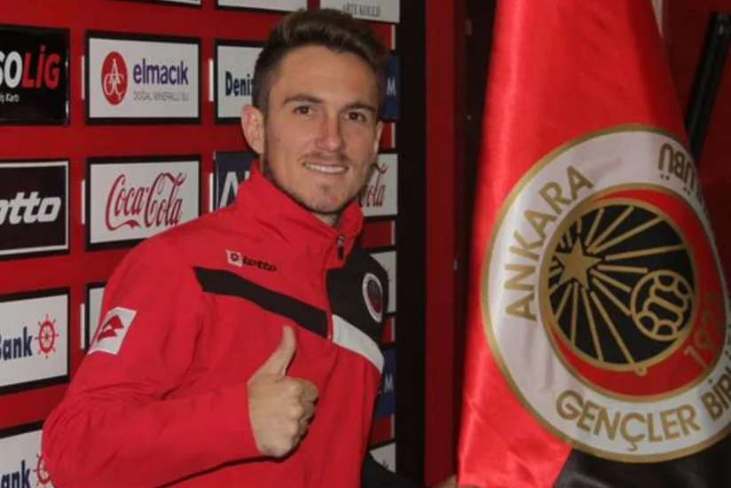Footballer signs contract with new club in hospital